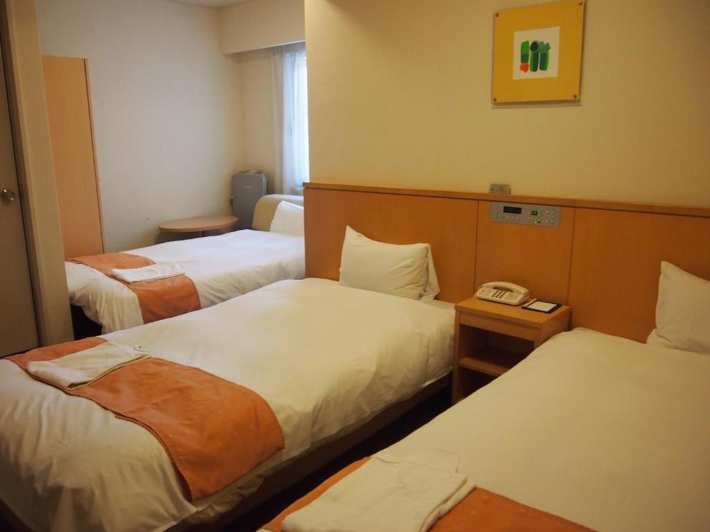 Nest Hotel Кумамото Номер фото